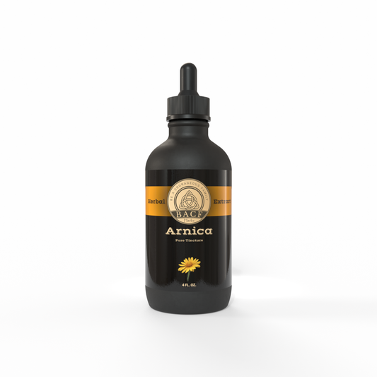 Black bottle of Arnica tincture with a apricot colored label on a white background. Made in the USA by Be A Courageous Family