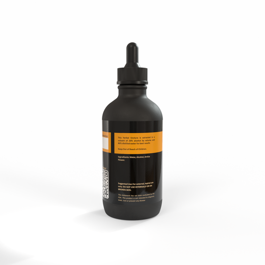 Black bottle of Arnica tincture with a apricot colored label on a white background. Made in the USA by Be A Courageous Family